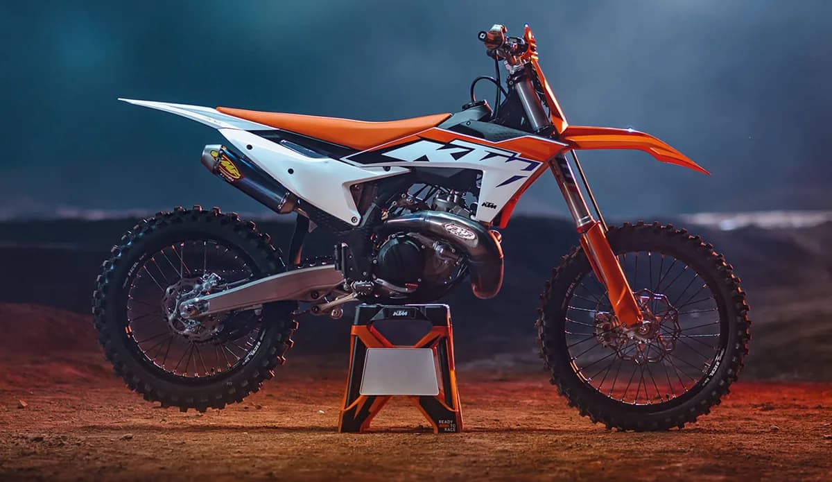 Dirt bike on a stand at dusk