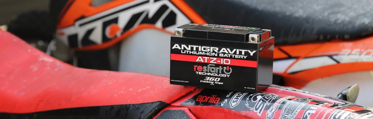 Antigravity ATZ-10 RE-START battery mounted on a dirt bike